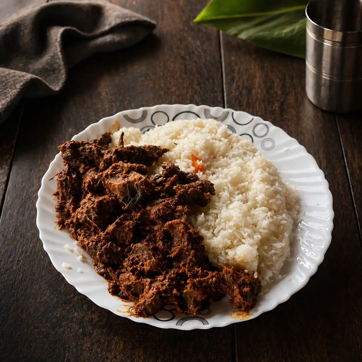 Neichor and beef curry served at KollyaBeef